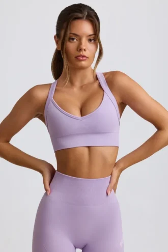 Sujetador deportivo sin costuras Super Sculpt con espalda cruzada en lila suave