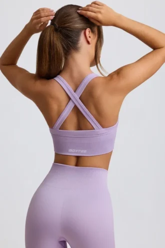 Sujetador deportivo sin costuras Super Sculpt con espalda cruzada en lila suave