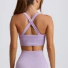Sujetador deportivo sin costuras Super Sculpt con espalda cruzada en lila suave