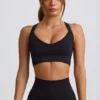 Sujetador deportivo sin costuras Super Sculpt con espalda cruzada en negro