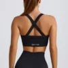 Sujetador deportivo sin costuras Super Sculpt con espalda cruzada en negro