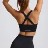 Sujetador deportivo sin costuras Super Sculpt con espalda cruzada en negro