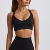Sujetador deportivo sin costuras Super Sculpt con espalda cruzada en negro
