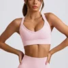 Sujetador deportivo sin costuras Super Sculpt con espalda cruzada en rosa empolvado