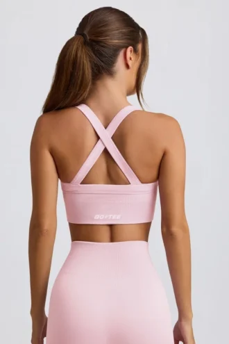 Sujetador deportivo sin costuras Super Sculpt con espalda cruzada en rosa empolvado