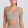 Sujetador deportivo sin costuras Super Sculpt con tirantes cruzados en gris jaspeado