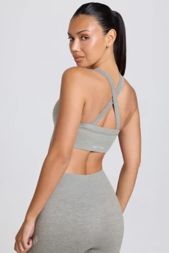 Sujetador deportivo sin costuras Super Sculpt con tirantes cruzados en gris jaspeado