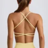Sujetador deportivo sin costuras y sin espalda Super Sculpt en amarillo mantequilla