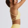 Sujetador deportivo sin costuras y sin espalda Super Sculpt en amarillo mantequilla