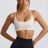 Sujetador deportivo sin costuras y sin espalda Super Sculpt en blanco