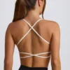 Sujetador deportivo sin costuras y sin espalda Super Sculpt en blanco