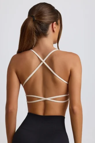 Sujetador deportivo sin costuras y sin espalda Super Sculpt en blanco
