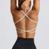 Sujetador deportivo sin costuras y sin espalda Super Sculpt en blanco