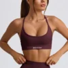 Sujetador deportivo sin costuras y sin espalda Super Sculpt en color burdeos