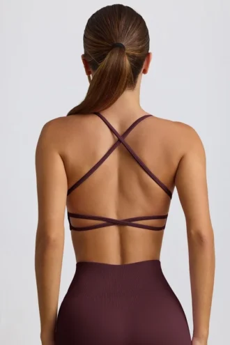 Sujetador deportivo sin costuras y sin espalda Super Sculpt en color burdeos