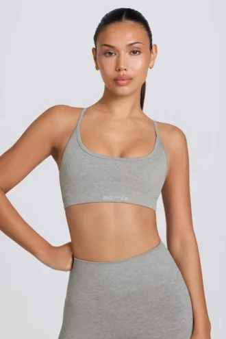 Sujetador deportivo sin costuras y sin espalda Super Sculpt en gris jaspeado