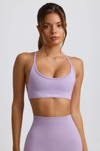 Sujetador deportivo sin costuras y sin espalda Super Sculpt en lila suave