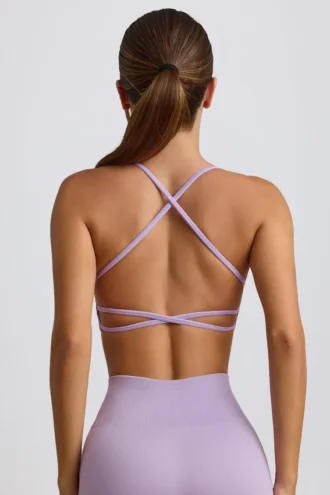 Sujetador deportivo sin costuras y sin espalda Super Sculpt en lila suave