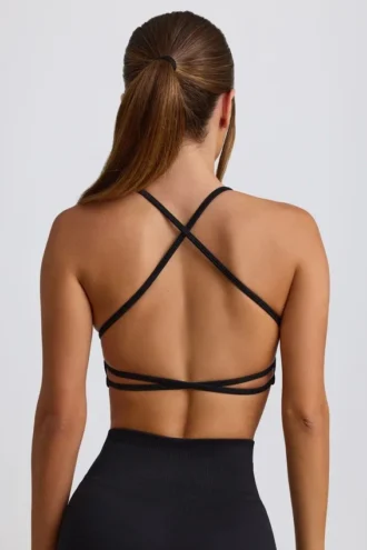 Sujetador deportivo sin costuras y sin espalda Super Sculpt en negro