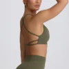 Sujetador deportivo sin costuras y sin espalda Super Sculpt en verde claro