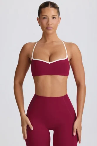 Sujetador deportivo Soft Active con cuello corazón en color burdeos