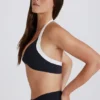 Sujetador deportivo Soft Active con cuello halter y detalle retorcido en la parte delantera en negro