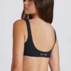 Sujetador deportivo Soft Active con detalle retorcido en la parte delantera en negro