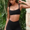 Sujetador deportivo Soft Active con detalles de costuras en negro