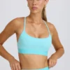 Sujetador deportivo Soft Active con espalda cruzada en color aguamarina