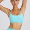 Sujetador deportivo Soft Active con espalda cruzada en color aguamarina