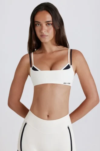 Sujetador deportivo Soft Active con espalda retorcida en marfil