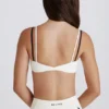 Sujetador deportivo Soft Active con espalda retorcida en marfil
