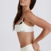 Sujetador deportivo Soft Active con espalda retorcida en marfil