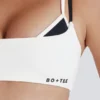 Sujetador deportivo Soft Active con espalda retorcida en marfil