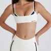 Sujetador deportivo Soft Active con espalda retorcida en marfil