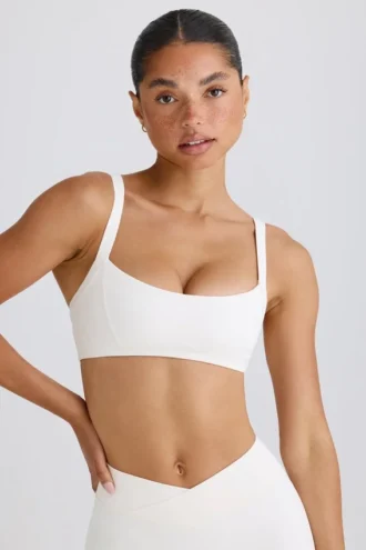 Sujetador deportivo Soft Active con ribete en contraste en blanco