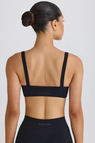 Sujetador deportivo Soft Active con ribetes en contraste en negro