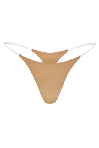 Tanga de punto sin costuras con tirantes transparentes en color caramelo
