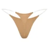 Tanga de punto sin costuras con tirantes transparentes en color caramelo
