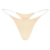 Tanga de punto sin costuras con tirantes transparentes en melocotón cálido