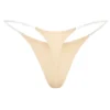 Tanga de punto sin costuras con tirantes transparentes en melocotón cálido