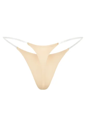 Tanga de punto sin costuras con tirantes transparentes en melocotón cálido