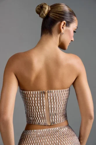 Top bandeau con adornos Charnelle en color almendra