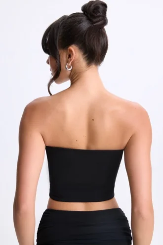 Top bandeau Edie con detalle retorcido en la parte delantera en negro