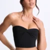 Top bandeau Edie con detalle retorcido en la parte delantera en negro
