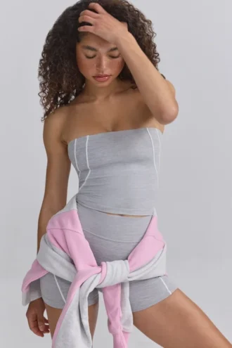 Top bandeau Soft Active con ribetes en contraste en gris jaspeado