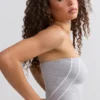 Top bandeau Soft Active con ribetes en contraste en gris jaspeado