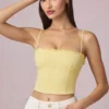 Top camisola Hania de modal con bordado inglés en amarillo limón