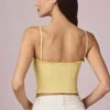 Top camisola Hania de modal con bordado inglés en amarillo limón