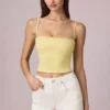 Top camisola Hania de modal con bordado inglés en amarillo limón